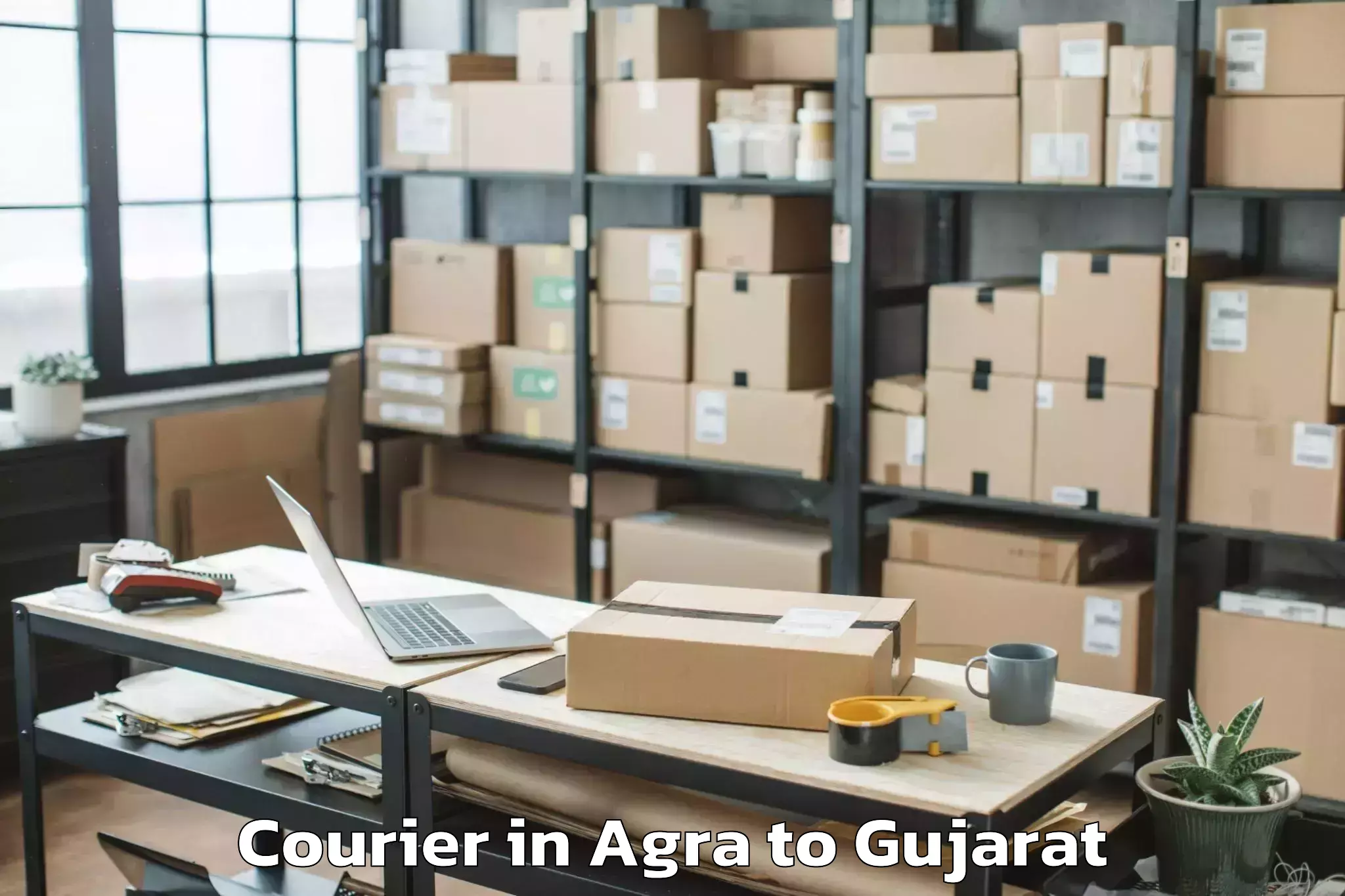 Book Your Agra to Hansot Courier Today